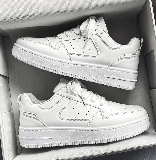 Pustende plattformsneakers i skinn
