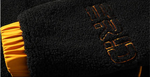 Vendbar hettejakke med lammeull for menn