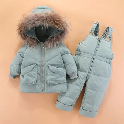 Vinter baby snödräkt med huva